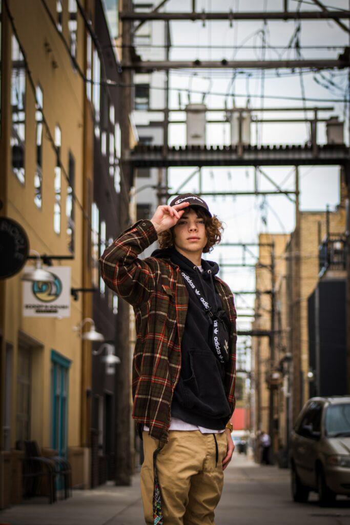 Senior portrait of a young man in the city.